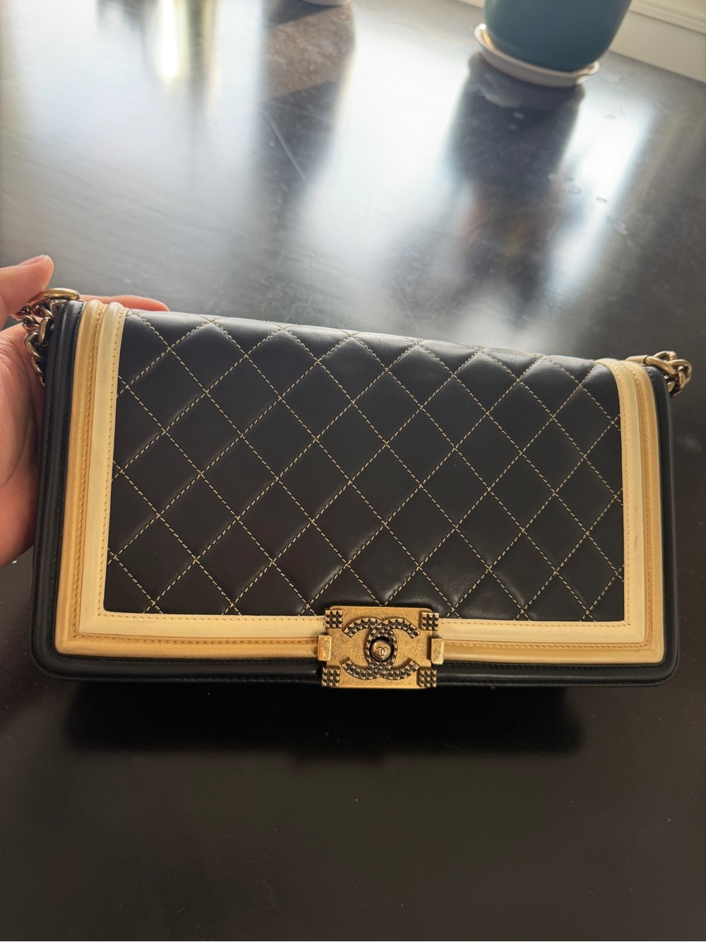 CHANEL Black and Cream Quilted Crossbody with Gold Hardware